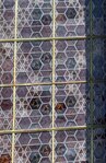 Glas in lood. Een abstracte weergave van benzeenmolecules?
<br/>
Marcel Westhoff, juni 2018